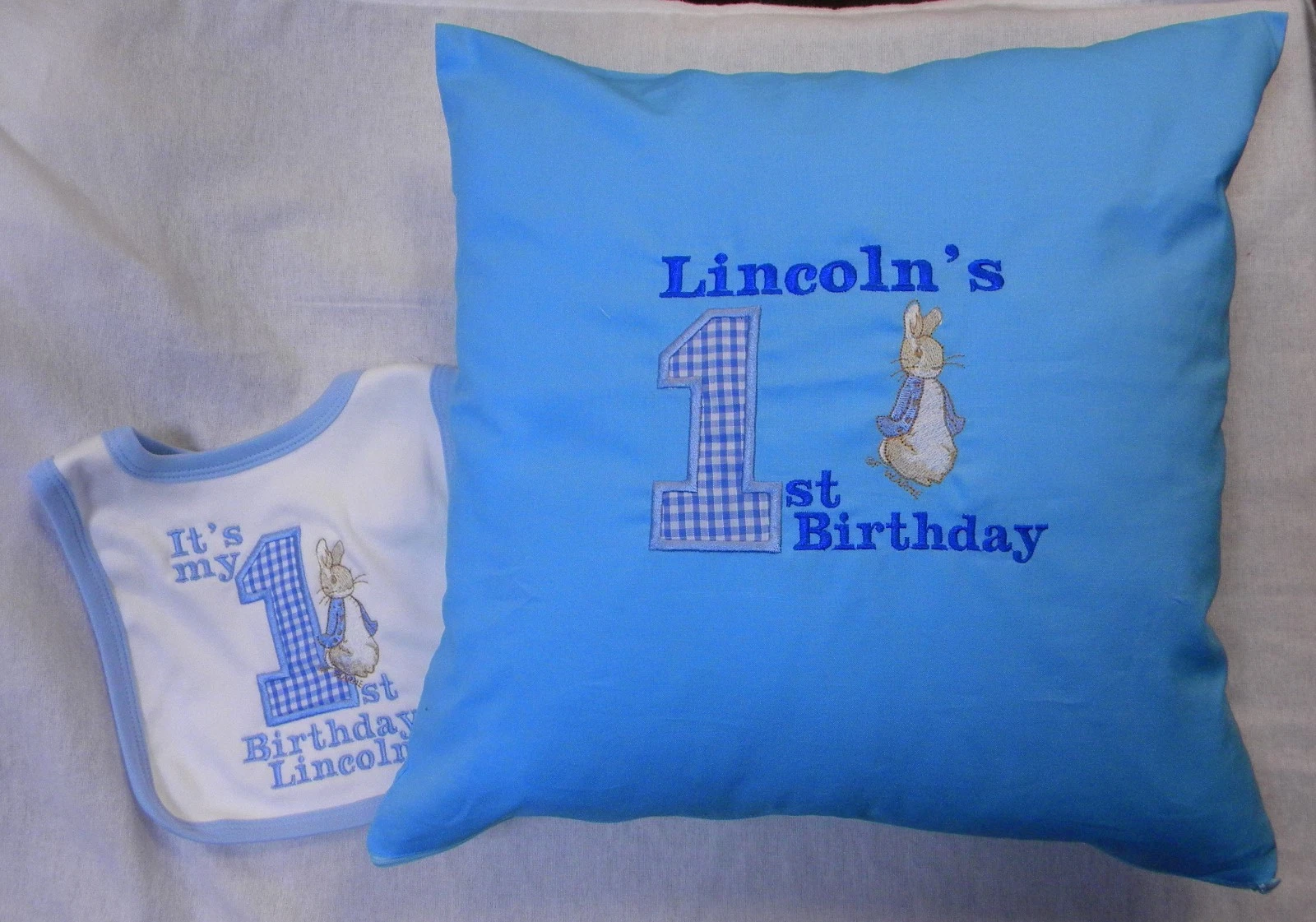 Personalised applique Peter Rabbit 1st birthday bib & cushion set gift pink blue