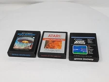 3x Atari Game Cartridge Lot: Raiders of the Lost Ark, Space Invaders & Jockey