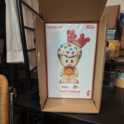 Fruity PEBBLES Edition of Project Fred 06 - 11'' Vinyl Collectible In Hand