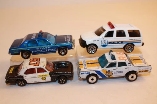 Four (4) Vintage 1970's - 1990's Matchbox / Zylmex Police Cars Cruisers SUV
