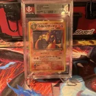 1997 P.M. Pokemon Japanese Rocket Gang Holo Dark Charizard #6 BgS 9 mint *SWIRL*
