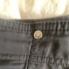 CHANEL Black Cotton Pants with Logo Button Accents and Pockets for Women