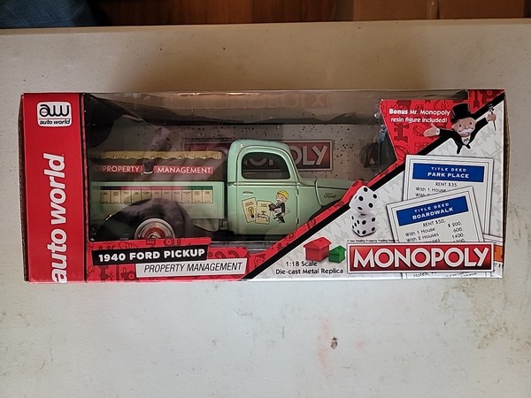 Camión Ford Property Management 1940 Auto World Monopoly escala 1/18 fundido a presión en caja original