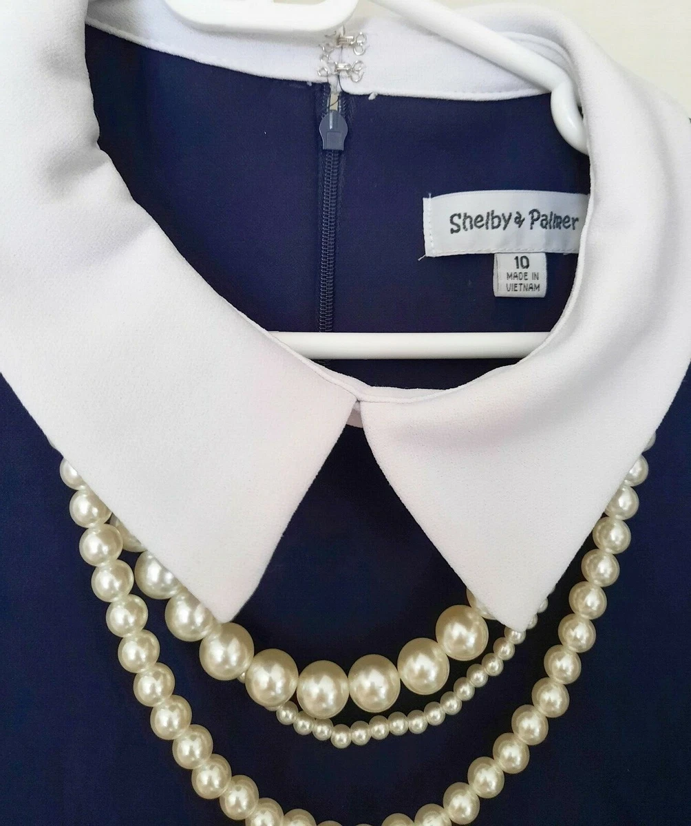 Navy blue dress clearance with pearl necklace