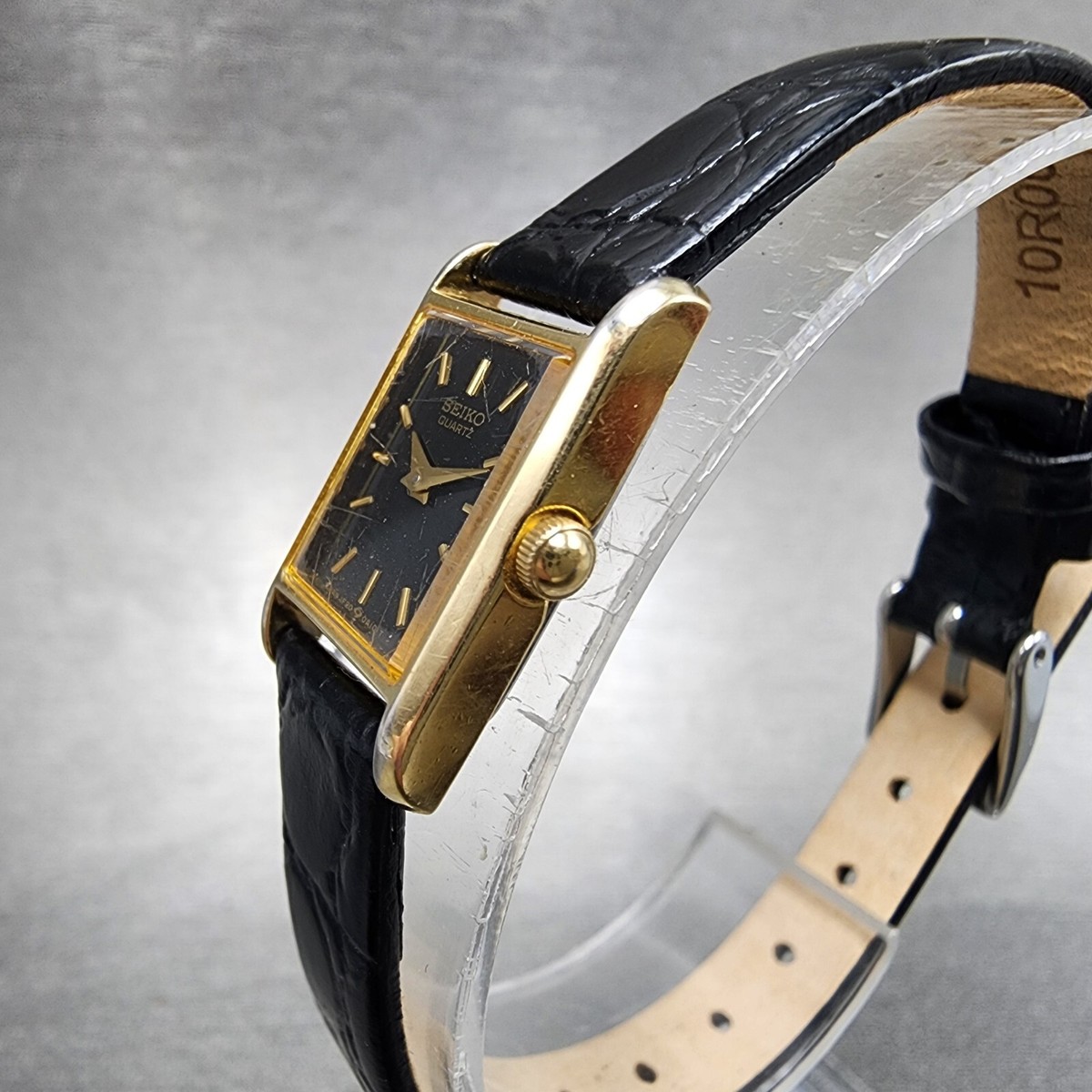 Seiko Tank Watch Women 14mm Black Dial Gold Tone Rectangle 1F20