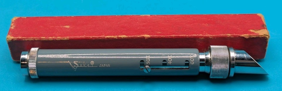 A Japanese-made Selsi 30x–60x pocket microscope from the vintage era — tiny, optical, and instantly satisfying for anyone who loves peering at the small stuff.