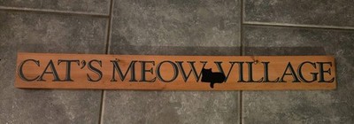 Cat's Meow Village Sign