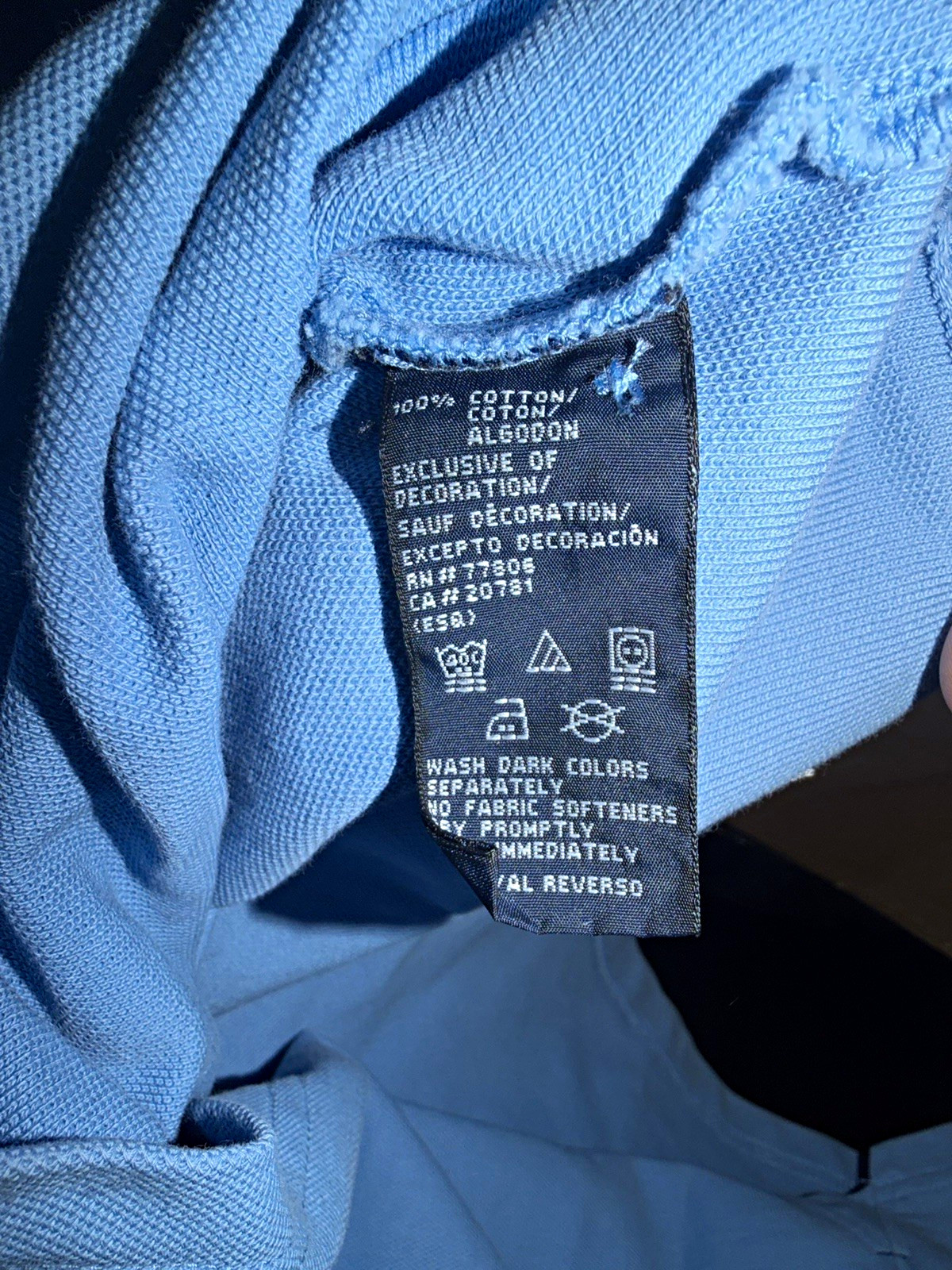 This vintage Tommy Hilfiger polo shirt was made in the mid-to-late 1990s
