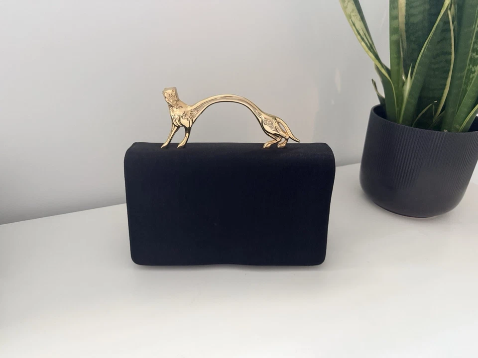 Bolso de mano negro elegante con asa de pantera dorada Foto 2 de 4