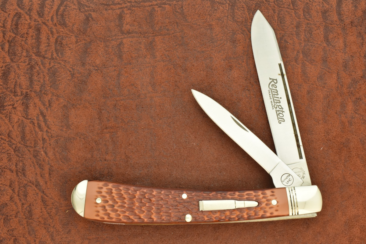 REMINGTON UMC USA BULLET KNIFE JIGGED DELRIN JUMBO BANANA TRAPPER