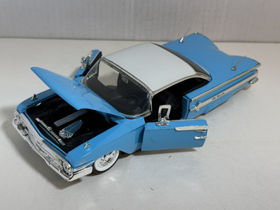 JADA SHOWROOM FLOOR 1960 CHEVY IMPALA BLUE 1:24 DIECAST MODEL CAR