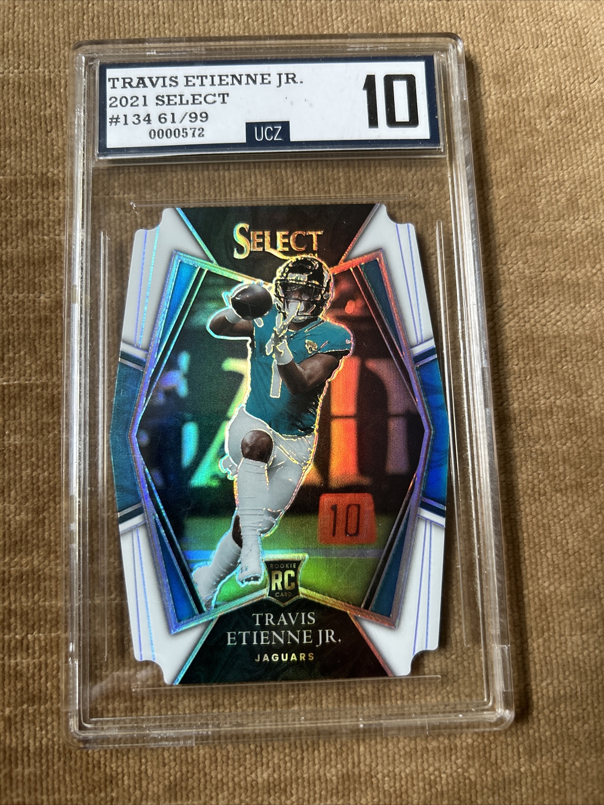 Travis Etienne Jr. 2021 Select Premier Level White Die Cut Prizm - Jaguars /99