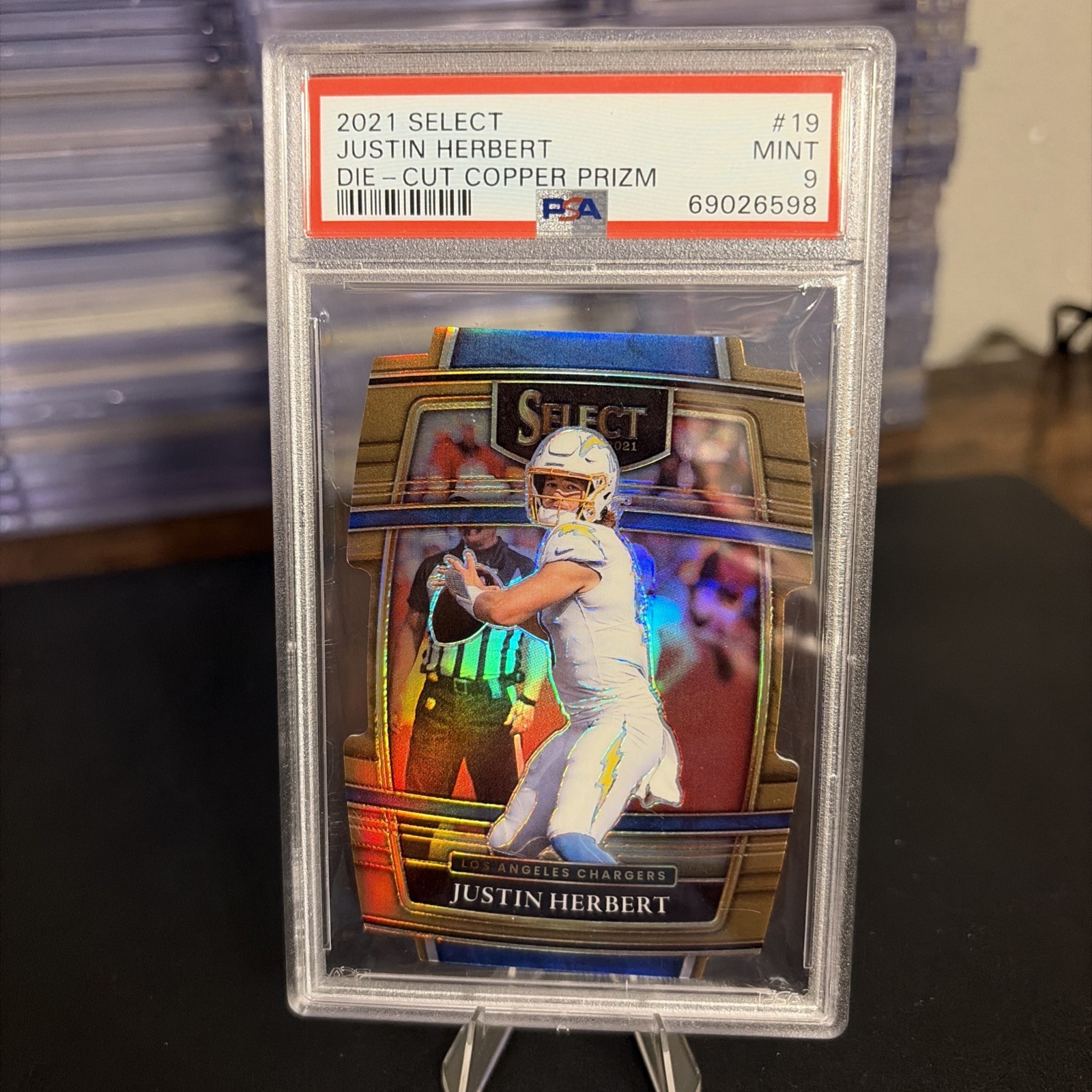 2021 Panini Select - Concourse Justin Herbert #19 Copper Prizm Die-Cut /199
