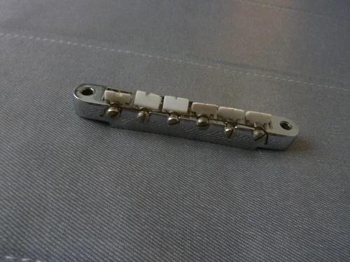 1960's Gibson Chrome Patent Number Bridge with Nylon Saddles