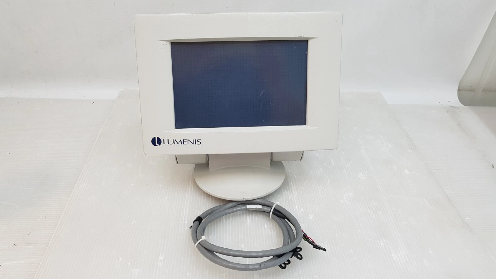 Lumenis Coherent Medical graphics terminal front view with coiled cable
