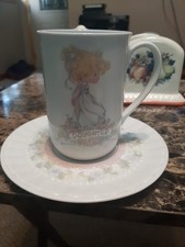 PRECIOUS MOMENTS " DAUGHTER " CUP AND SAUCER SET