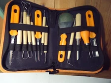 13 piece fruit and vegetable carving set/zippered case/instruction not included.