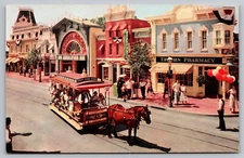 Postcard Disneyland Main Street Horse Drawn Upjohn Pharmacy