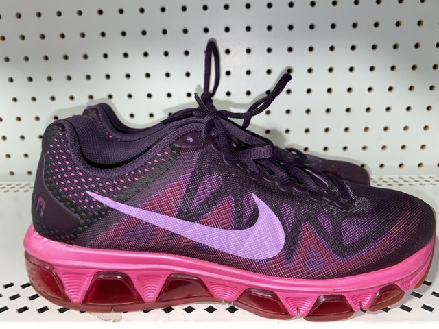 pink and purple nike slides