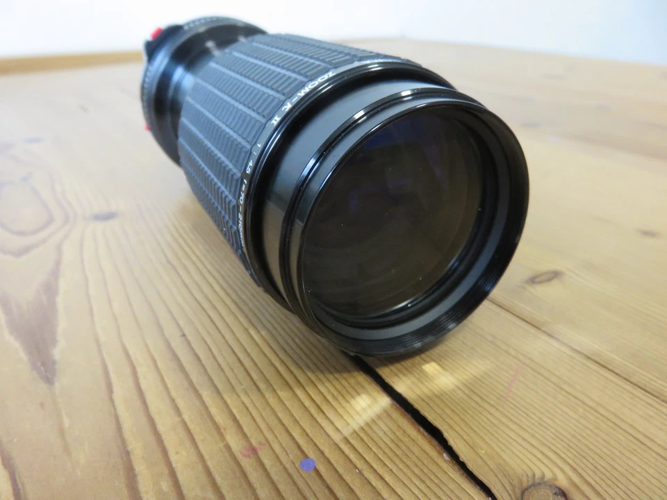 Objectif SIGMA ZOOM KII - 1 : 4,5 F =70 - 210 mm pour Canon FD / Bouchons /Etui - Photo 3/4
