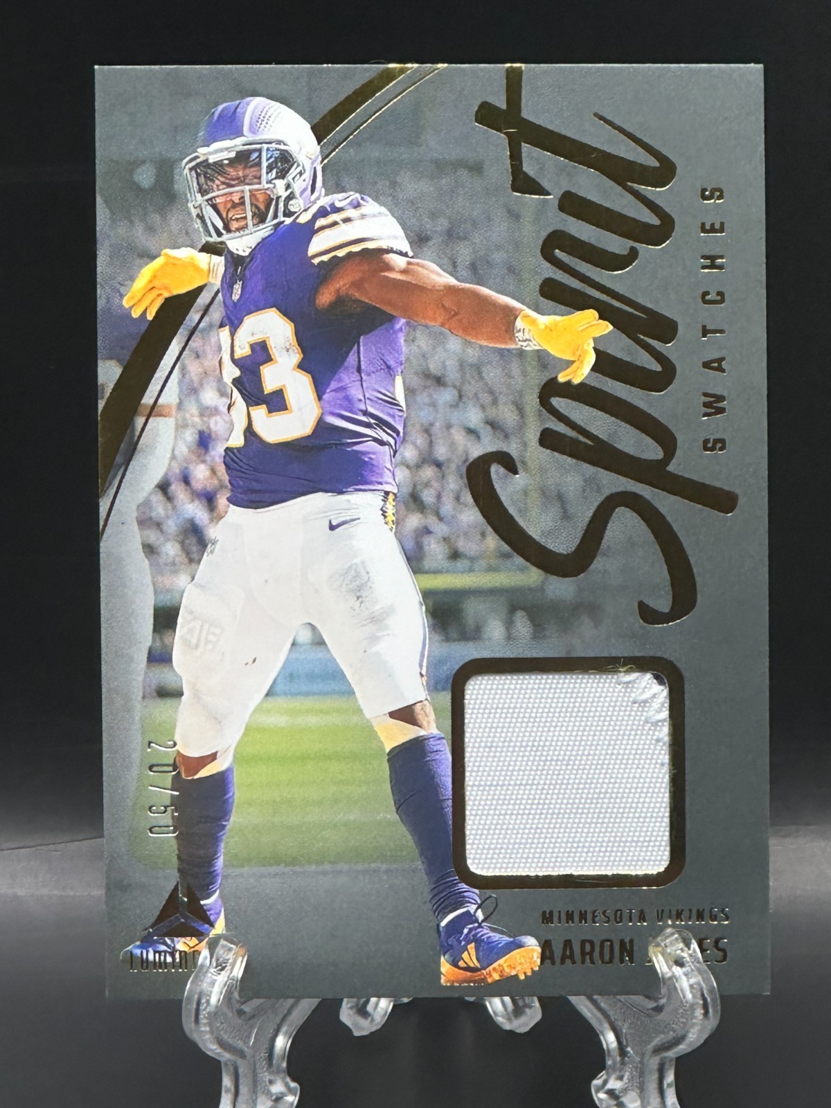 Aaron Jones 2025 Panini Luminance Spirit Swatches Gold /50 Vikings Mem #SSW-AJO