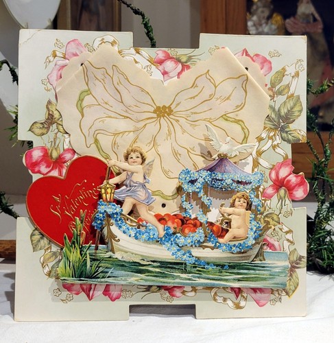 Art Nouveau.  Cupids sailing Flower Ladened Sailboat. USA. Early 1900s. Easel