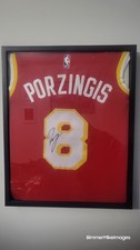 Kristaps Porzingis Signed Autographed Atlanta Hawks Jersey with frame.