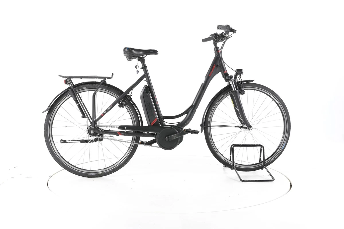 e mountainbikes sale Polygon Collosus N8E Year:2024 Category:Hollandrad_Alu  silber and secured with a Damenvelo Vermont - wie