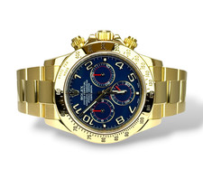 ROLEX Daytona - 116528 - 2015 - Blue Racing dial - Box and Papers - Yellow Gold