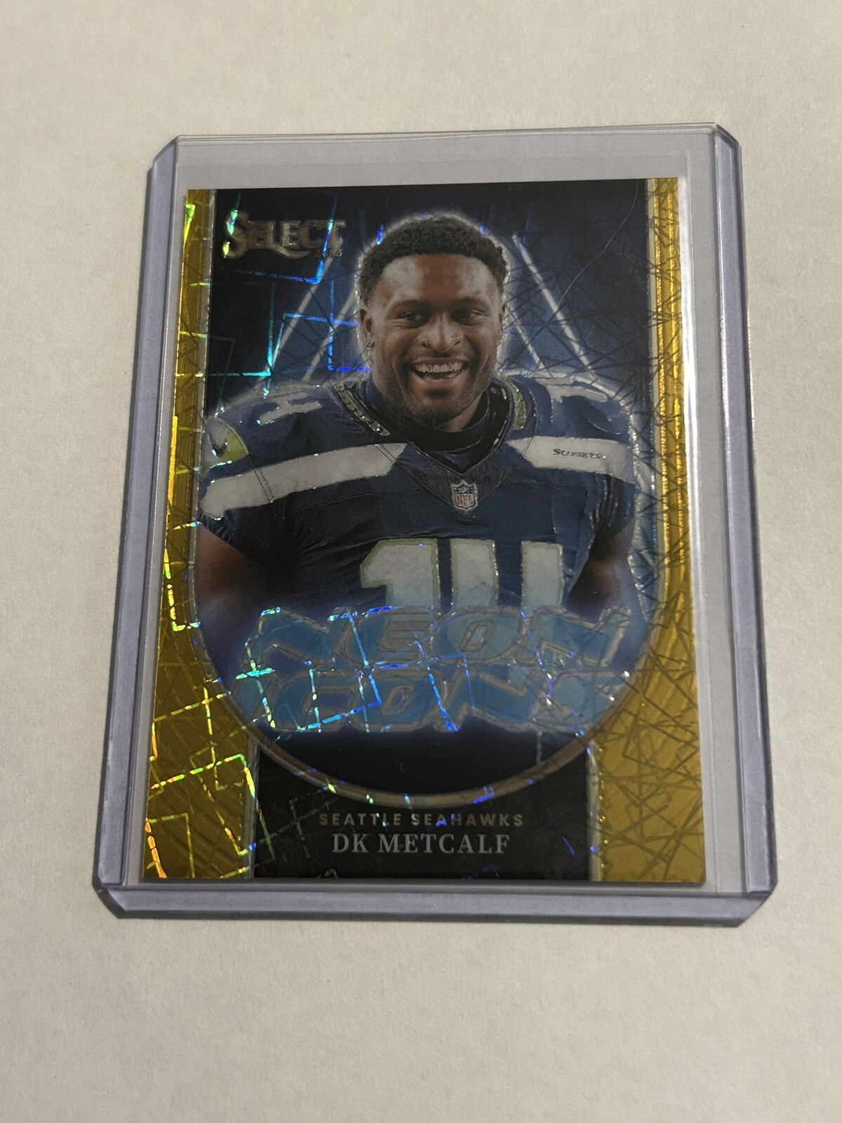 2023 Panini Select Football Neon Icons DK Metcalf Gold Prizm /10 Seattle