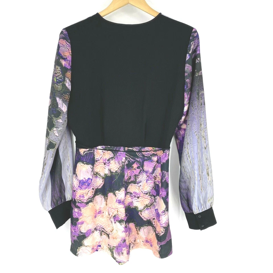 Mameluco Clover Canyon talla grande para mujer negro púrpura floral con volantes manga larga Foto 4 de 4