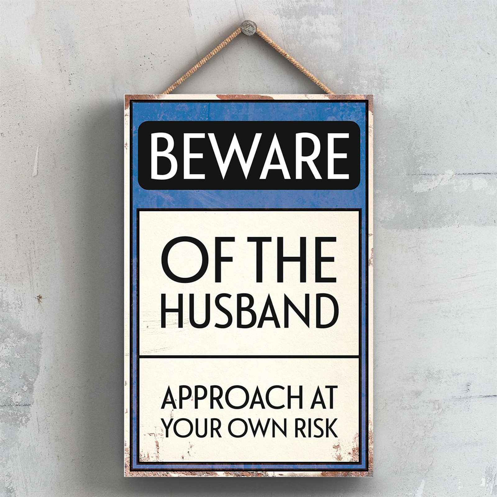 BEWARE OF THE HUSBAND TYPOGRAPHY SIGN PRINTED ONTO A WOODEN HANGING PLAQUE