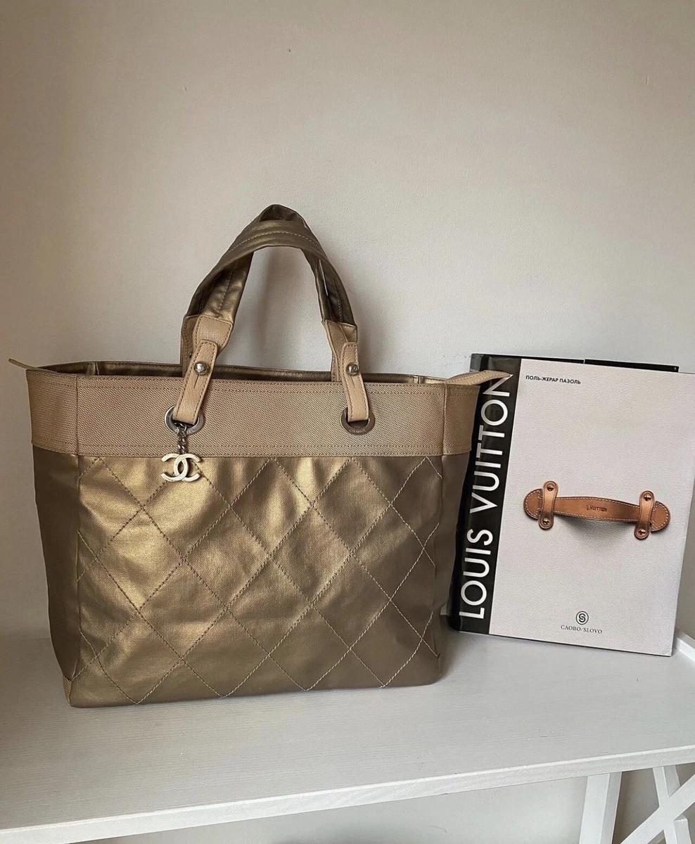 At Auction: Chanel Black and Beige Coated Canvas Central Station Tote