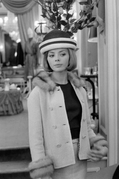 Barbara Lass trying on a hat in the 'Christian Dior' boutique   1962 Old Photo 1
