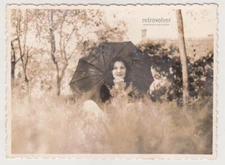 Grace Under the Umbrella Woman's Peaceful Escape into Nature’s Embrace Photo