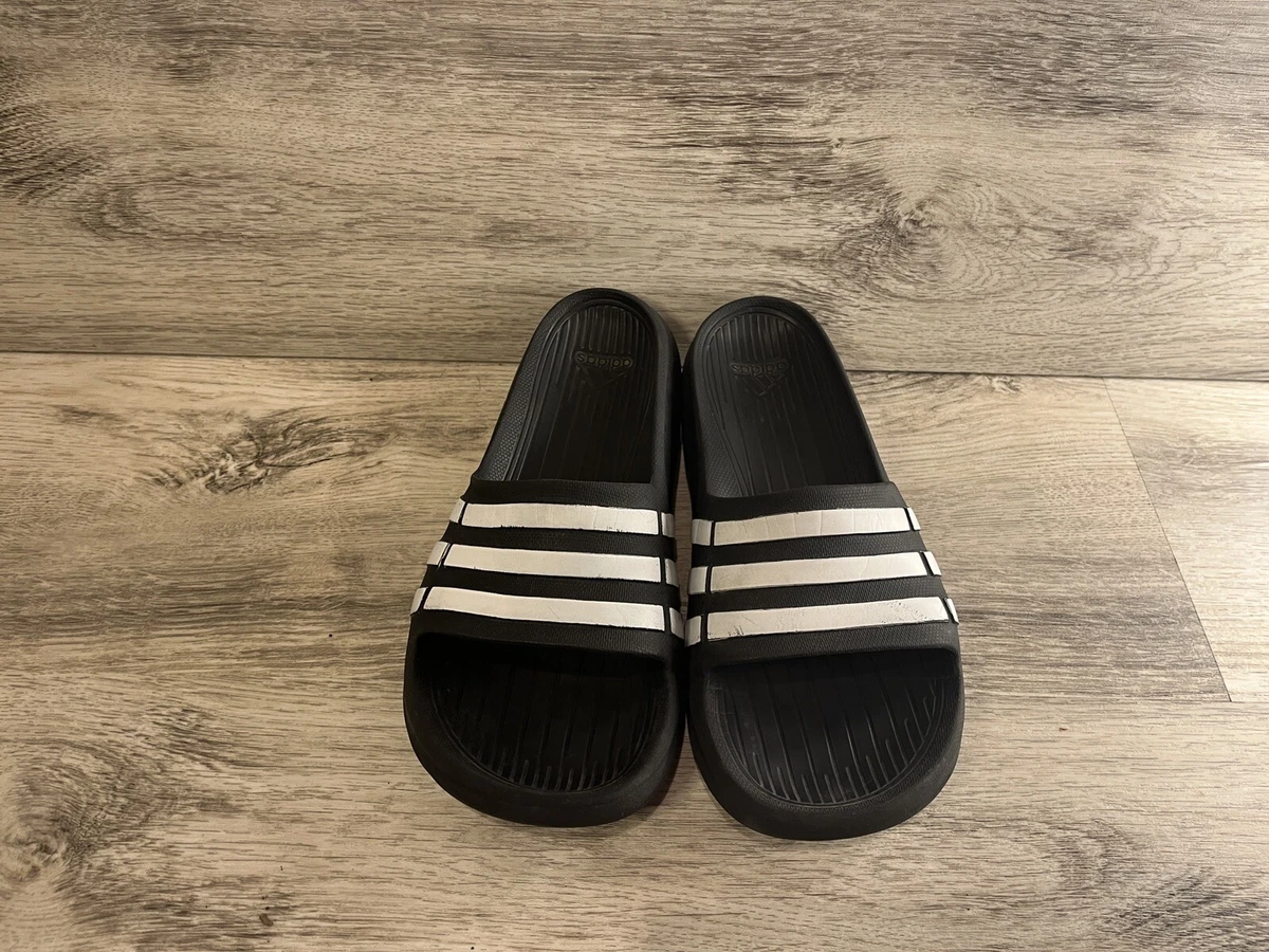 Adidas duramo top slides on feet