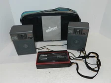 RED UNITECH MINI STEREO CASSETTE TAPE PLAYER W/ AM/FM & SPEAKERS ST-2 PS107