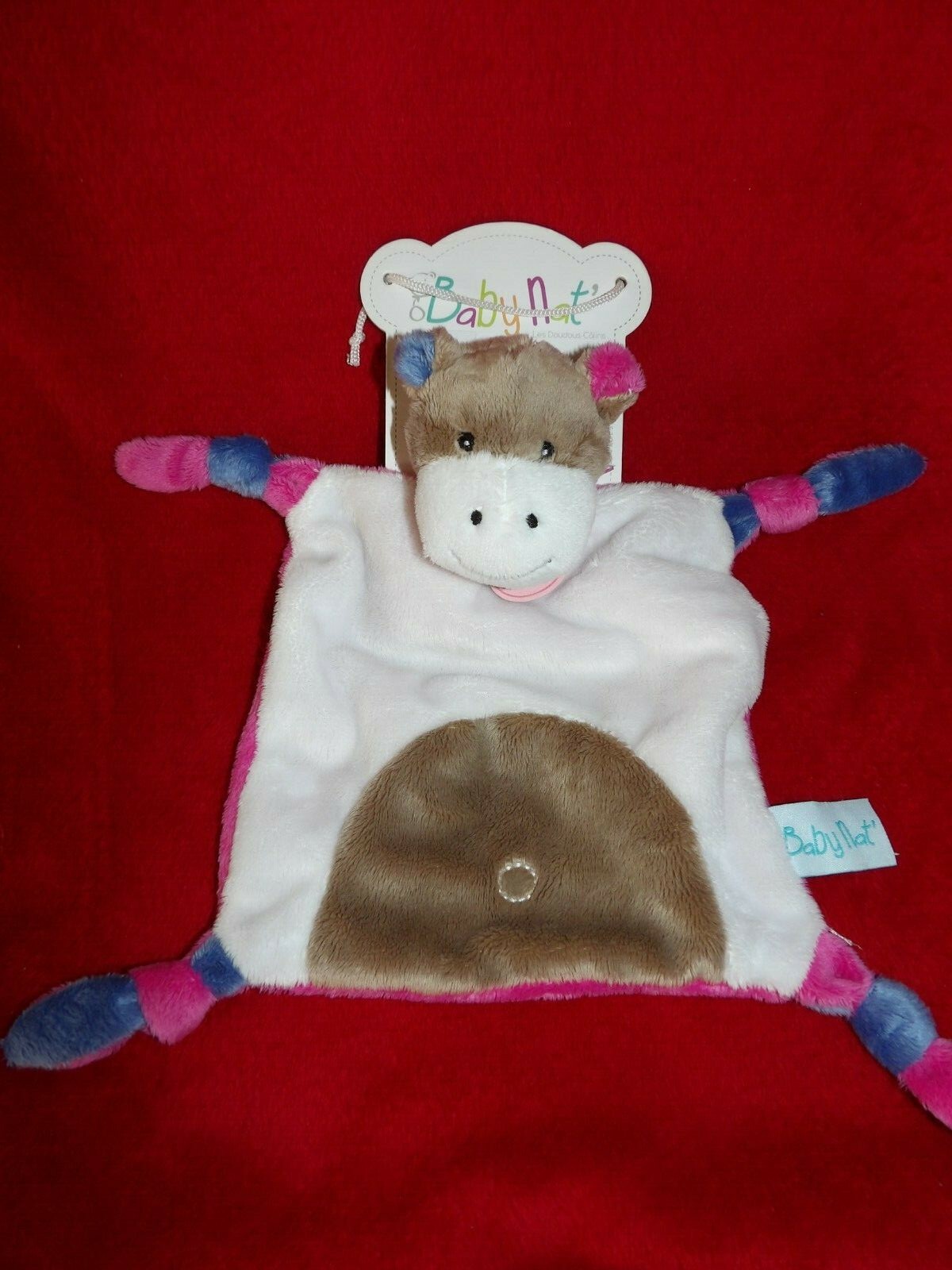 Doudou plat Babynat vache blanche et beige parfait pour les siestes en poussette