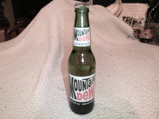 Full 12oz Mountain Dew Longneck Soda Bottle