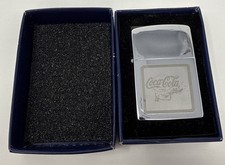 Vintage Dilong Coca Cola Lighter Flip Top Silver Coke Bottle with box Works