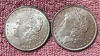 MORGAN SILVER DOLLAR COINS.  LOT OF 2 UNC.  PRE. 1921 LOT # 2