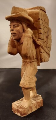 Handcarved Asian Man With Basket Of Wood
