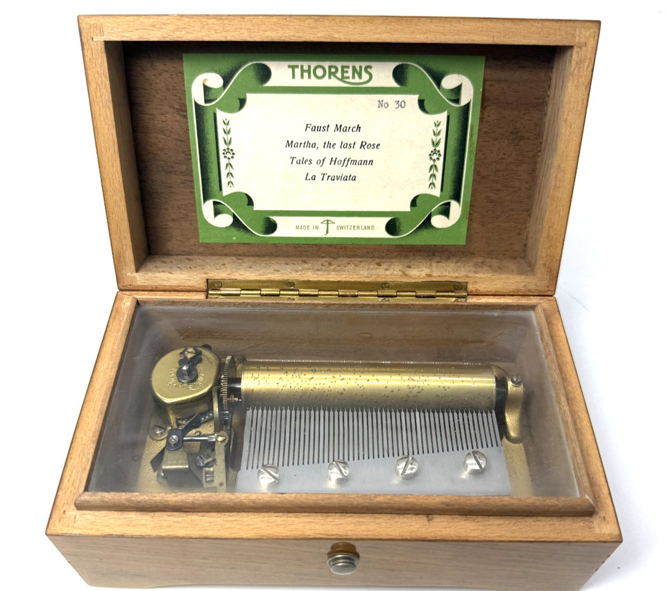 A proper Swiss Thornes No. 30 cylinder music box playing four songs — the kind of mechanical marvel that commands a room.