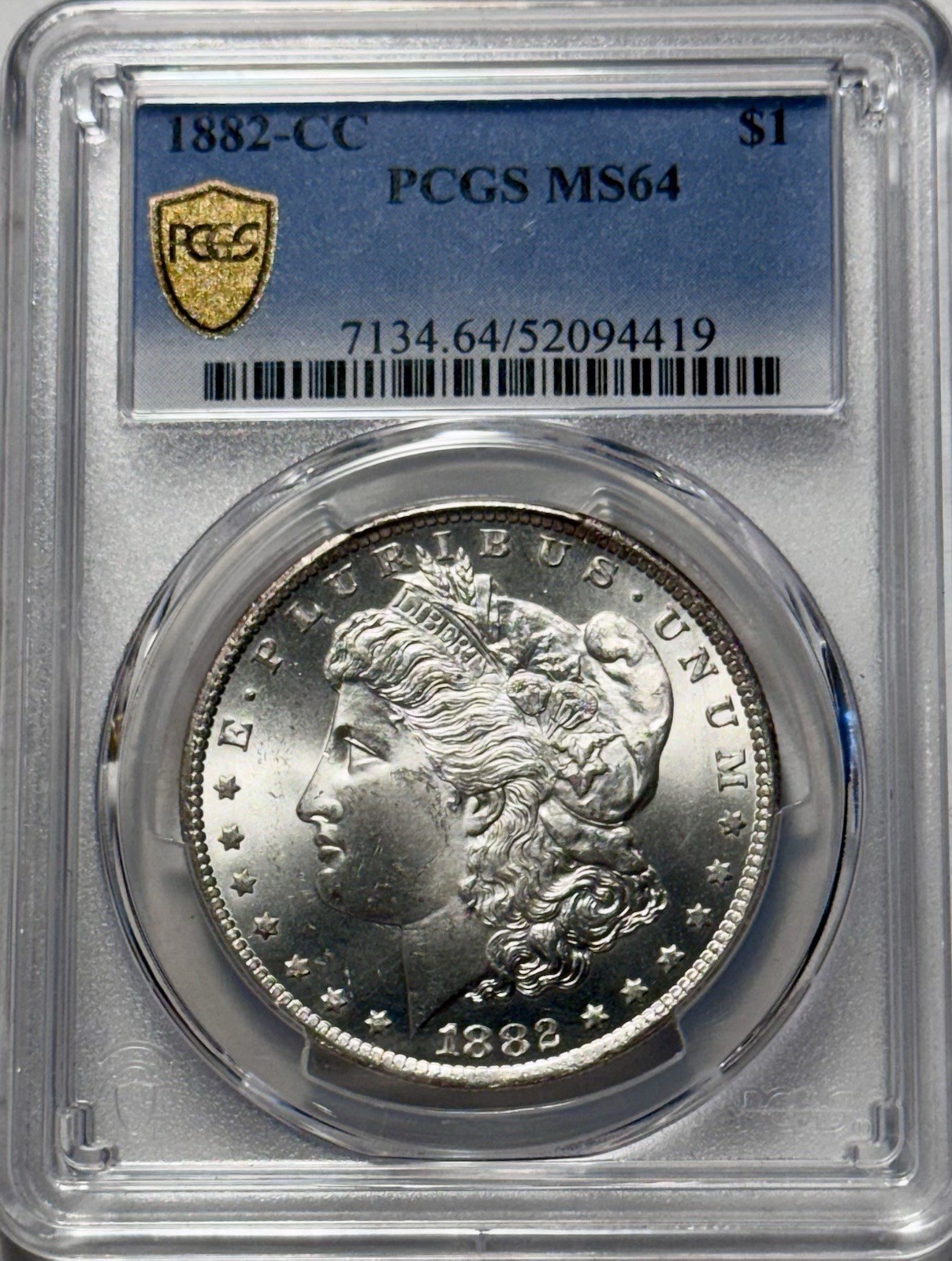 1882-CC Morgan Silver Dollar PCGS MS64 Gold Shield