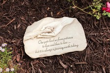 Evergreen Garden Dog Paw in Hand Devotion Painted Polystone Our Pets Lead Us