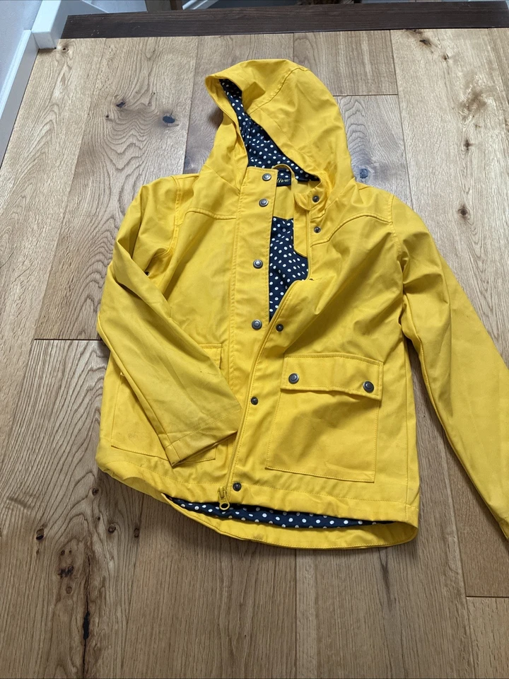 Sonnengelbe Regenjacke - Bild 1 von 4