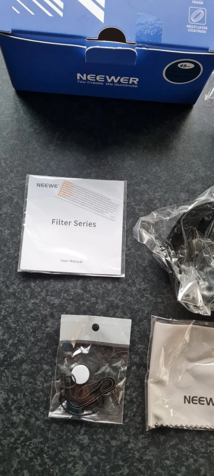 Neewer 49mm Objektivfilter Zubehörset ND + UV + CPL Filter + Gummi Gegenlichtblende + - Bild 4 von 4