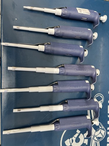 set of 7 Rainin Pipet-Lite LTS Pipettes L10, L100, L200, 4x L1000, And Stand