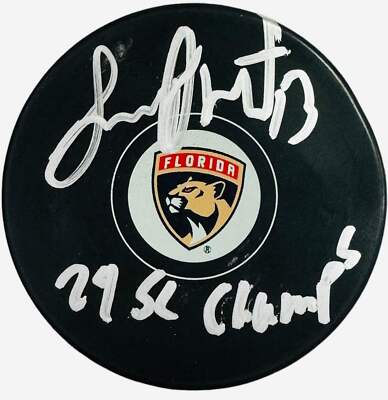 Sam Reinhart Autographed ''Stanley Cup Champs'' Florida Panthers Puck (Beckett)