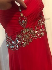red prom/ evening dress with jewel design, size 14. No stains. 